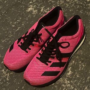 Adidas running sneakers in pink. Never worn!